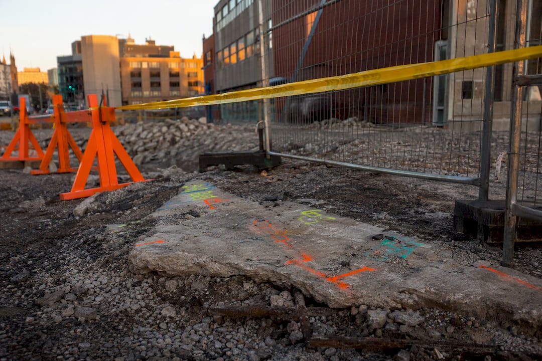 Safety barriers and inspection markings at demolition site