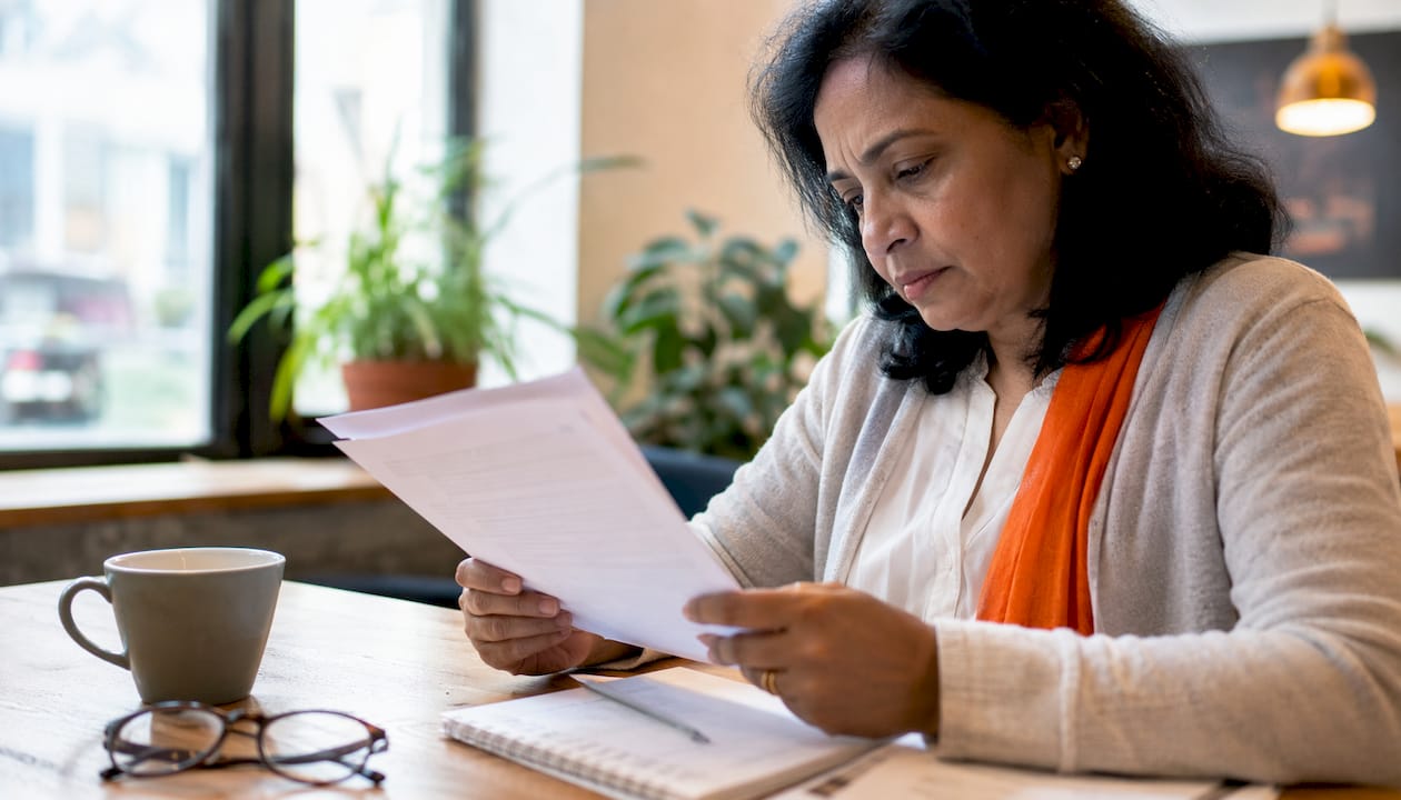 Person reading removal restrictions document