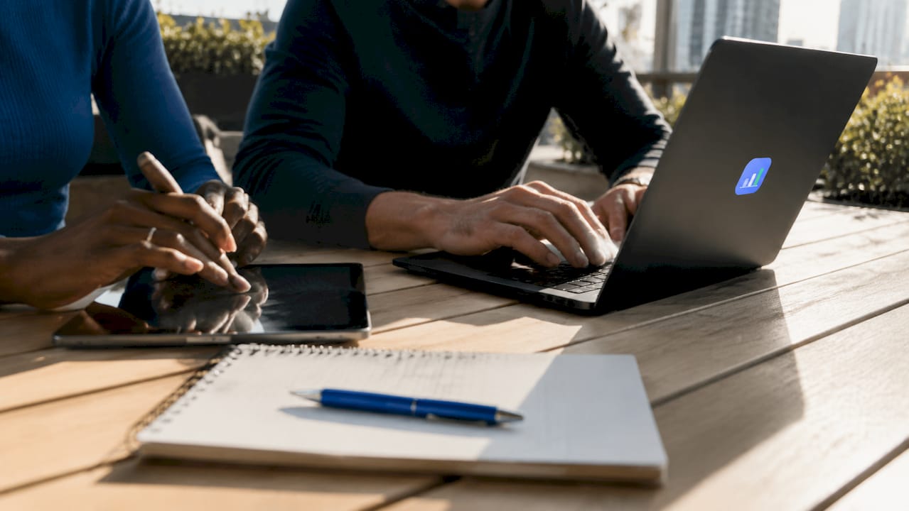 Hands configuring multi-account trading automation