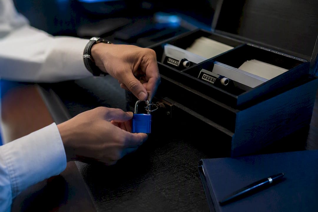 Hand securing lock symbolizing trading audit