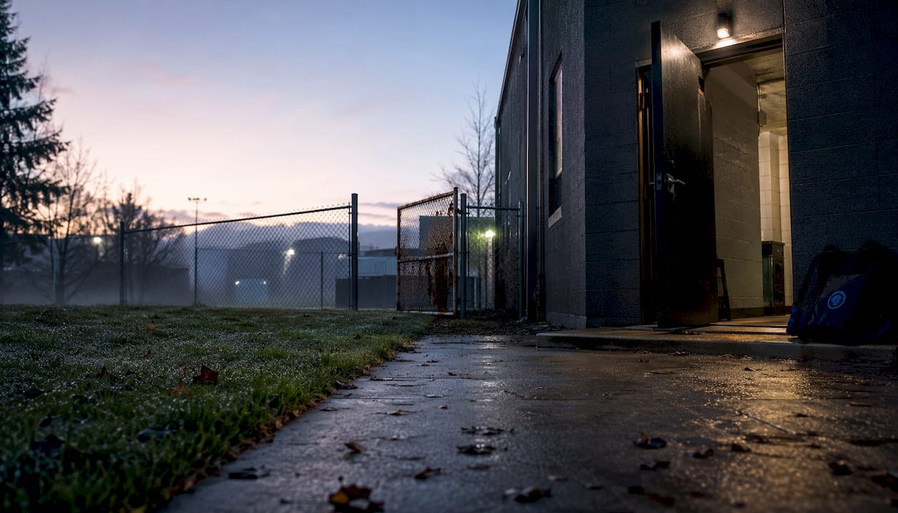 Dimly lit commercial property showing unsecured entry points