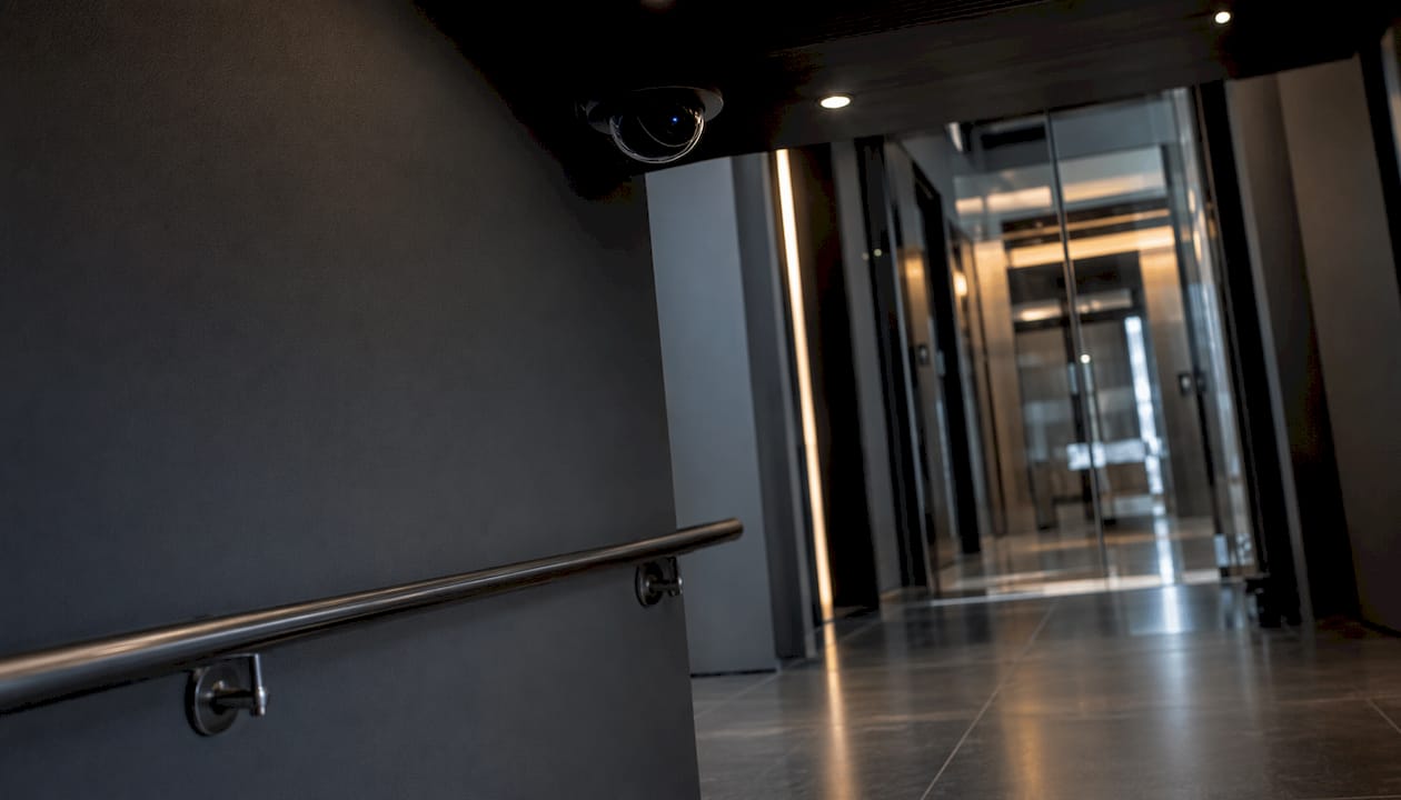 CCTV camera monitoring stairwell and elevator lobby