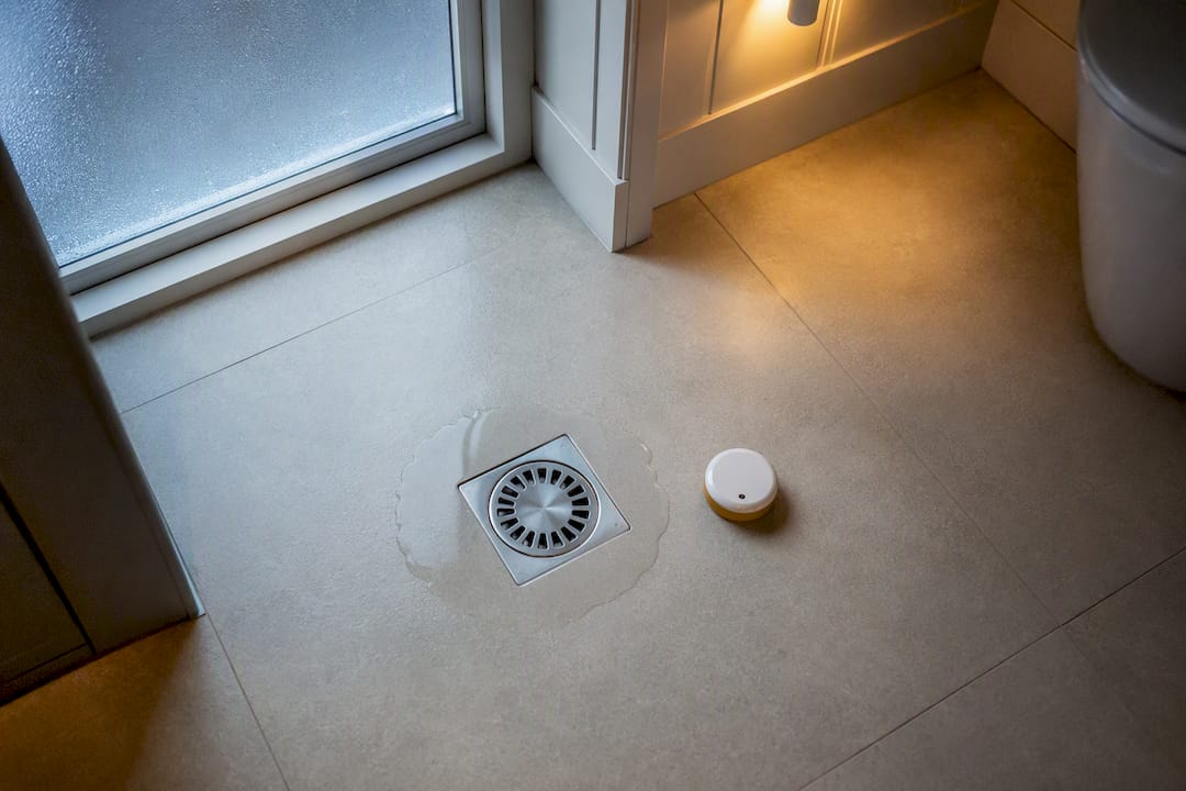 Water pooling around indoor floor drain