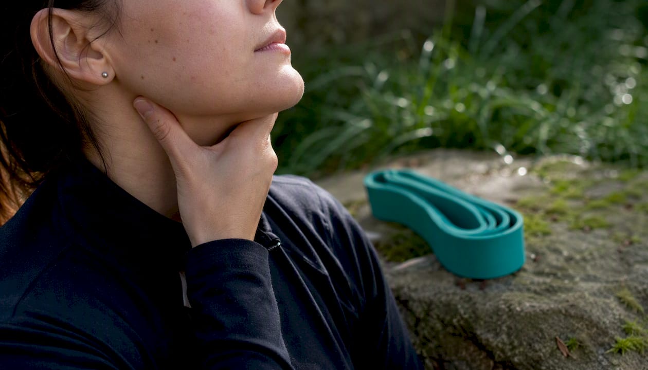 Hands doing isometric neck hold exercise