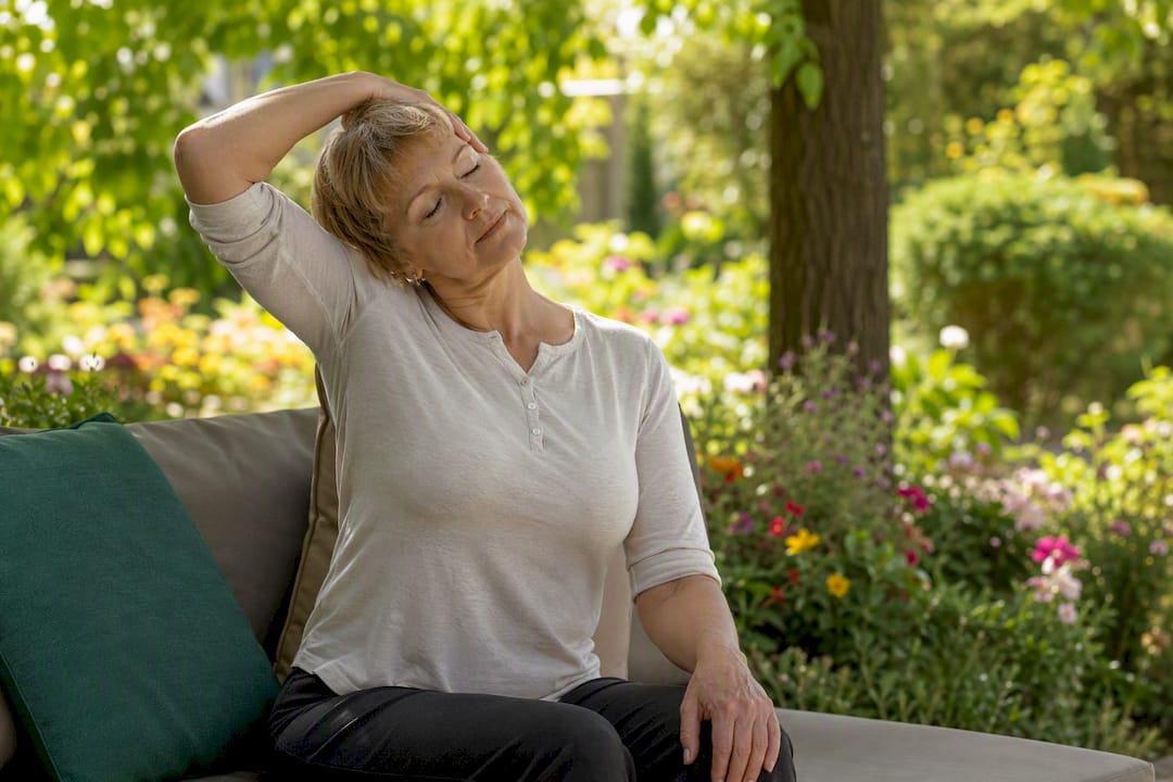 Person performing neck stretch at home