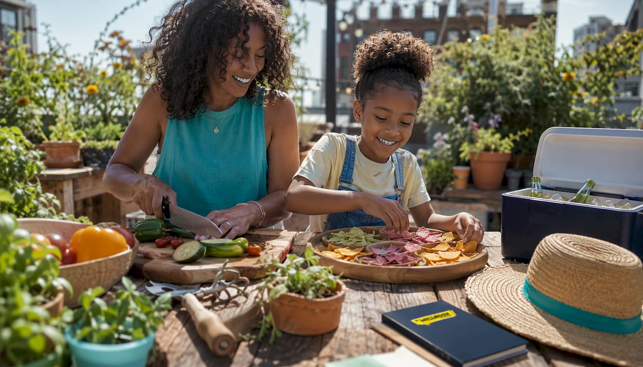 Parent and child preparing healthy snacks in kitchen
