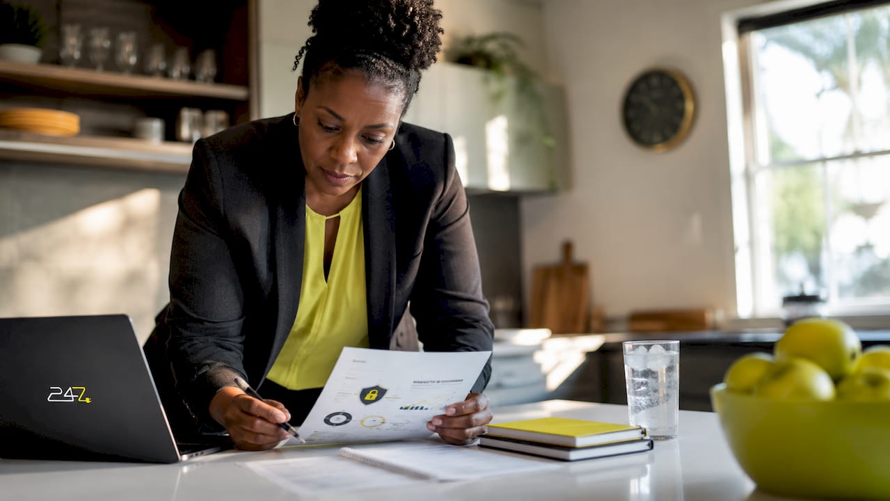 Woman reviewing IT security documents