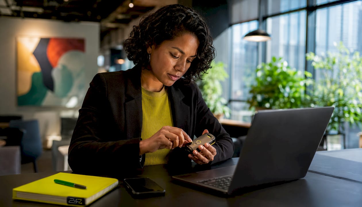 Small business owner setting up cybersecurity tools