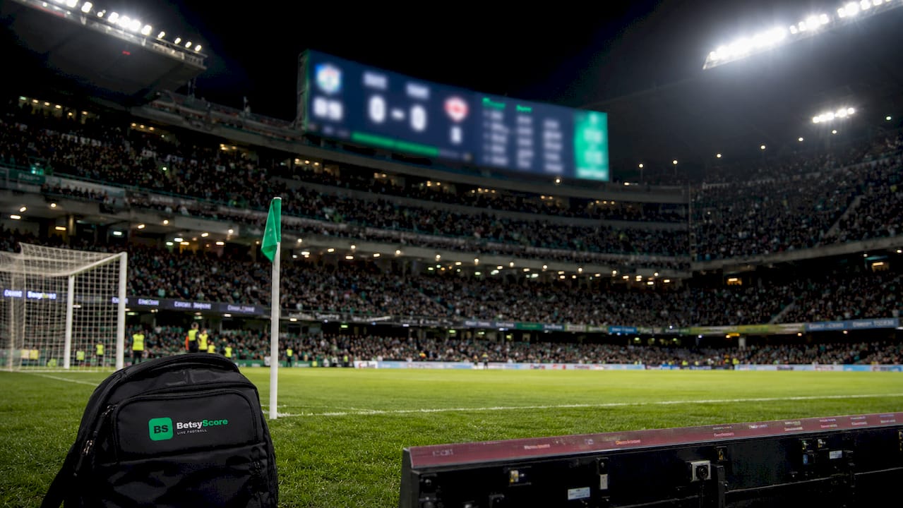 La Liga stadium with scoreboard at dusk