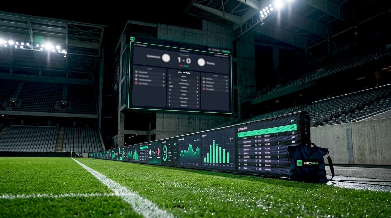 Football stadium scoreboard and stats display