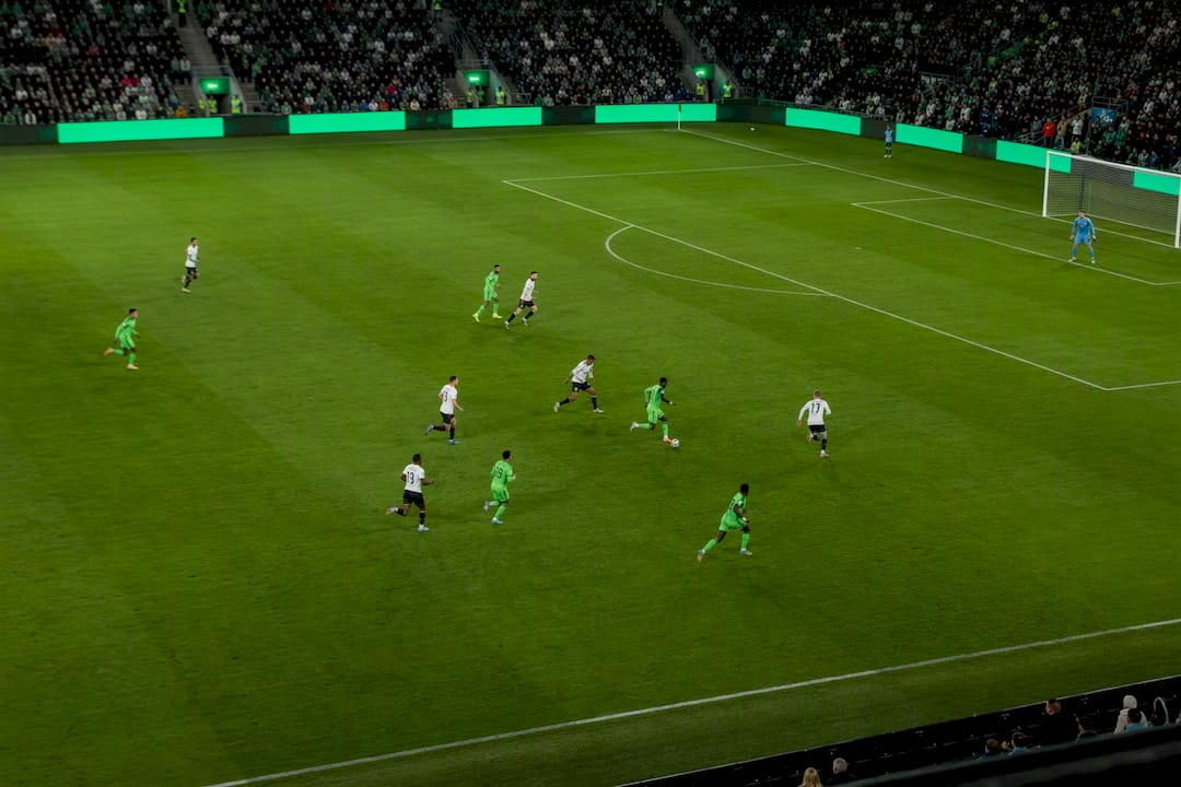 Football stadium action near goal area