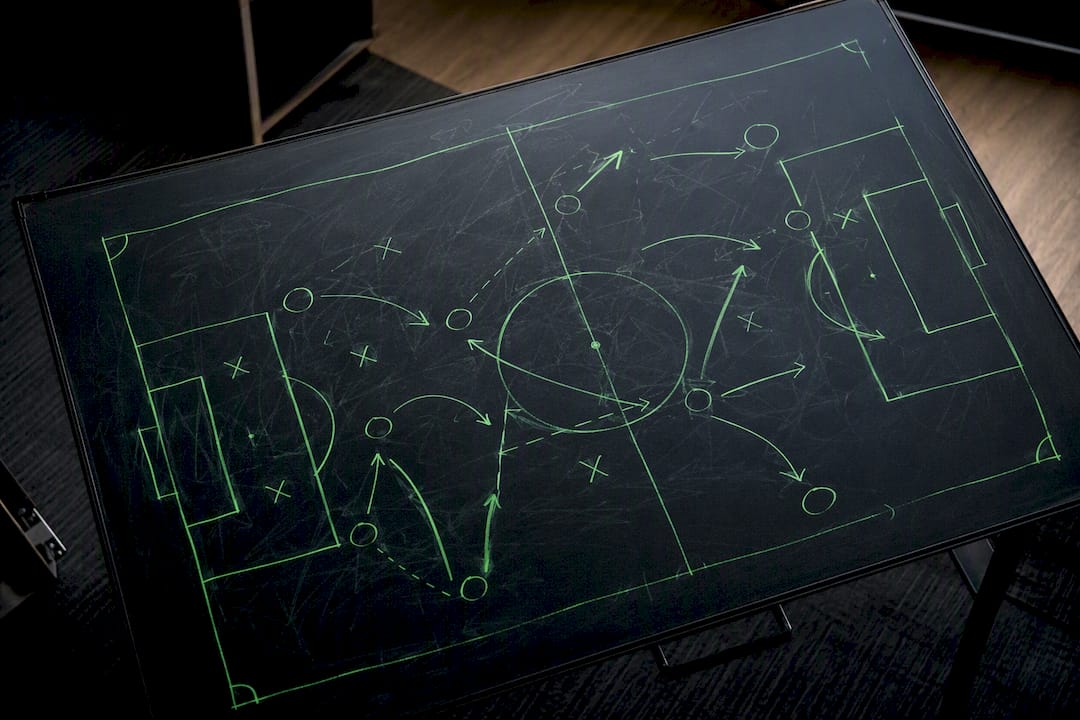 Digital football tactics board with defensive formations