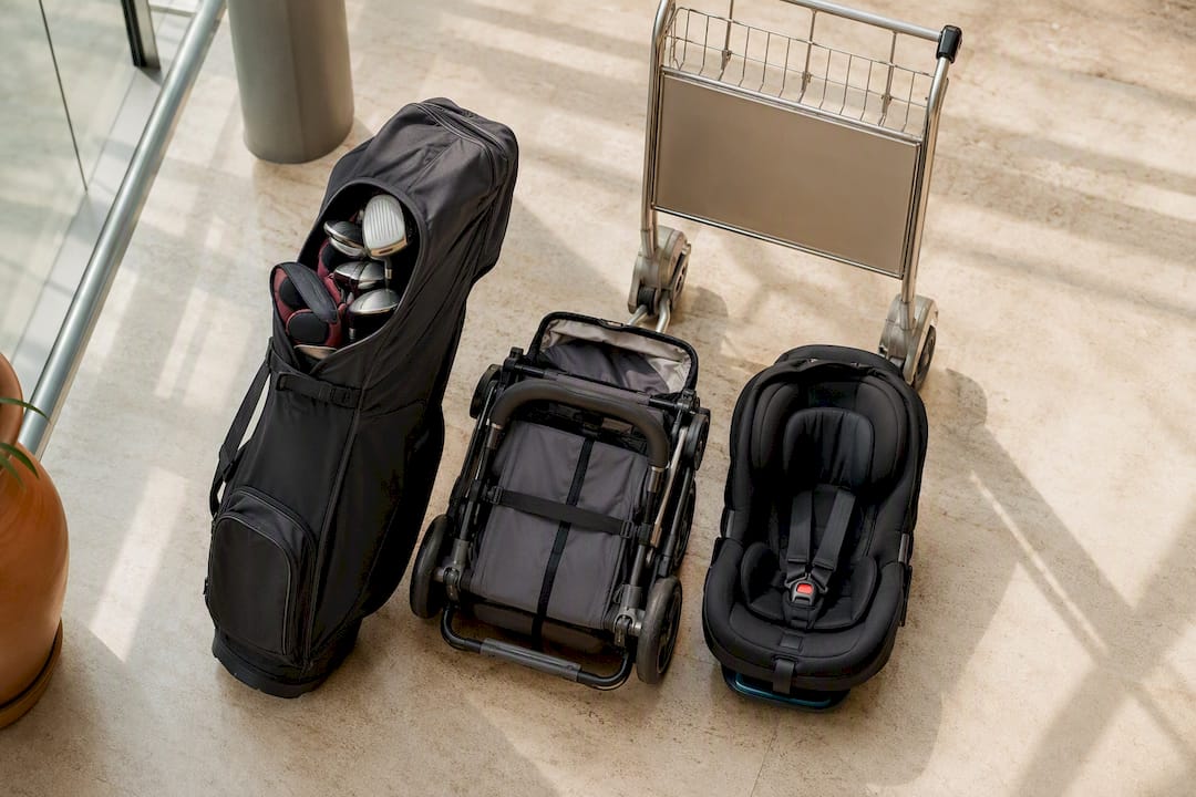 Golf clubs pushchair and car seat together