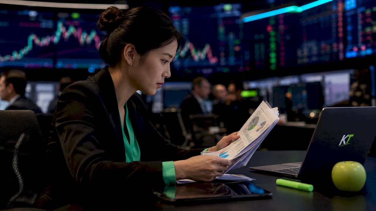 Risk manager reviewing trading risk reports