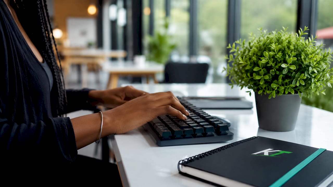 Close-up of hands using keyboard shortcuts