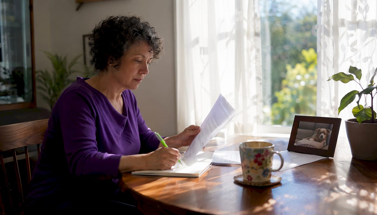 Solo pet owner reviewing safety plan documents