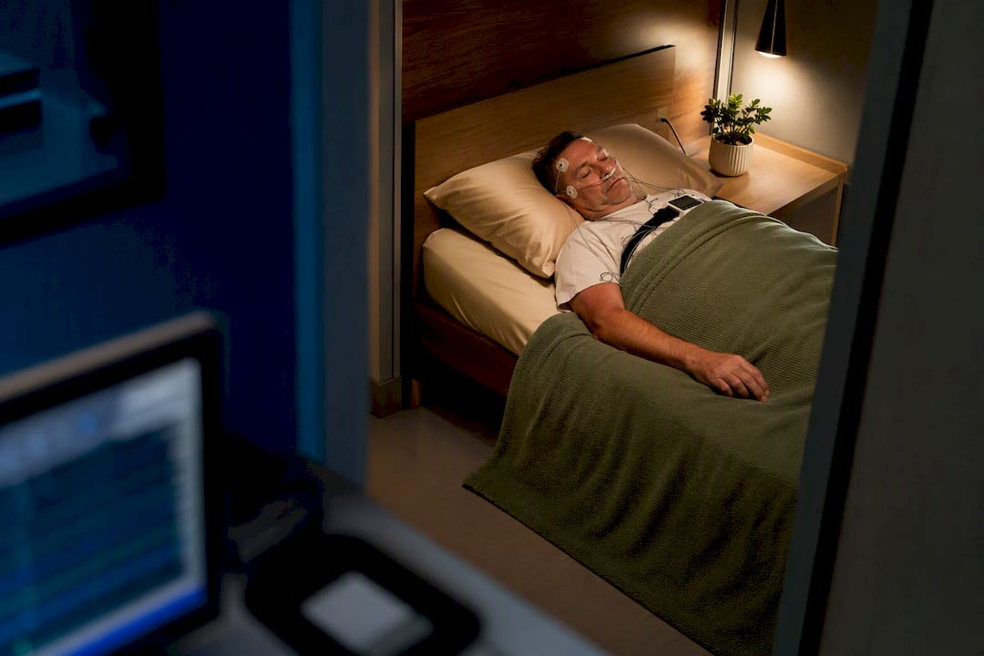 Patient undergoing overnight sleep apnea study