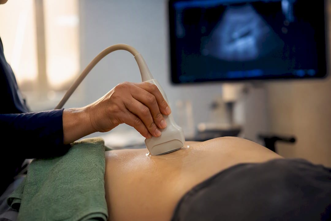 Clinician performing a gallbladder ultrasound