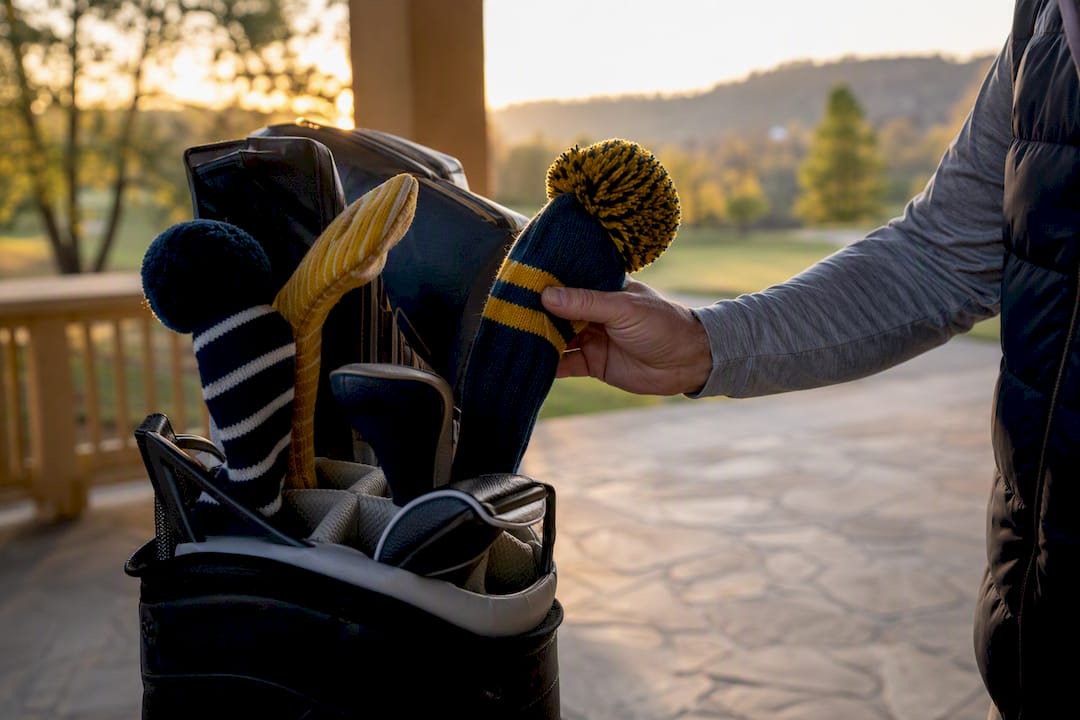 Golf bag dividers organizing headcovers on course