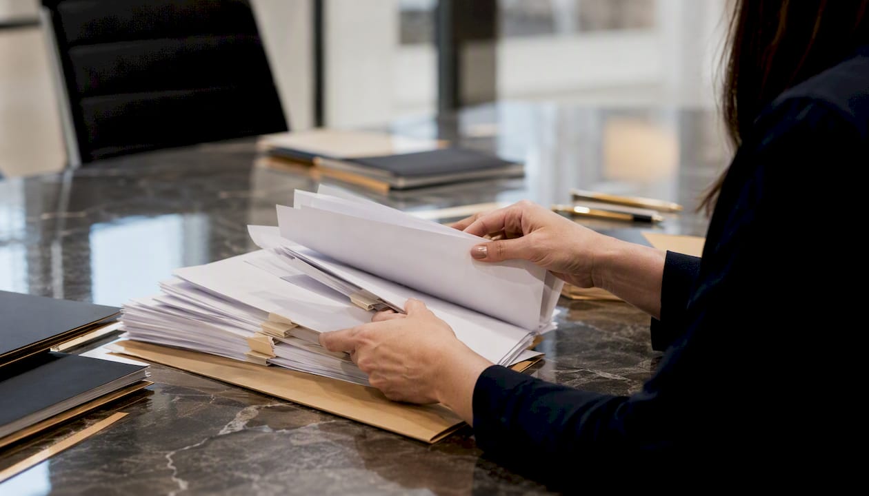 Hands processing escrow lien waiver forms