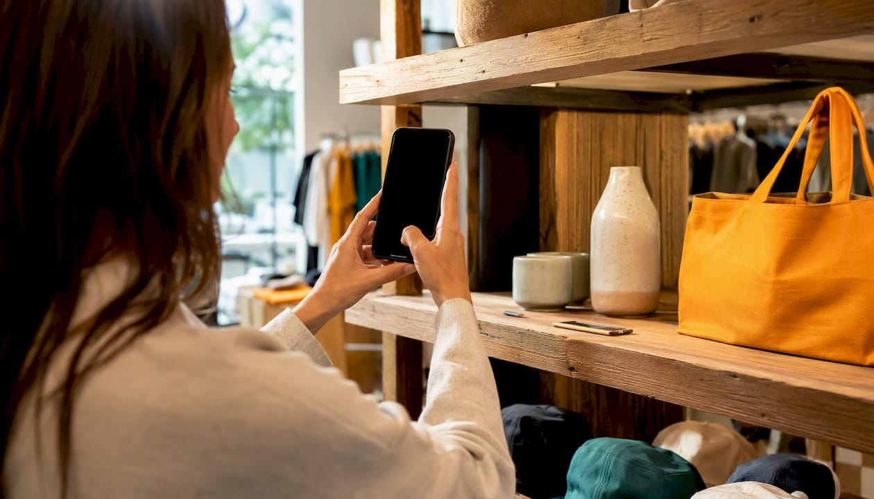 Customer hands taking product photo for Stories