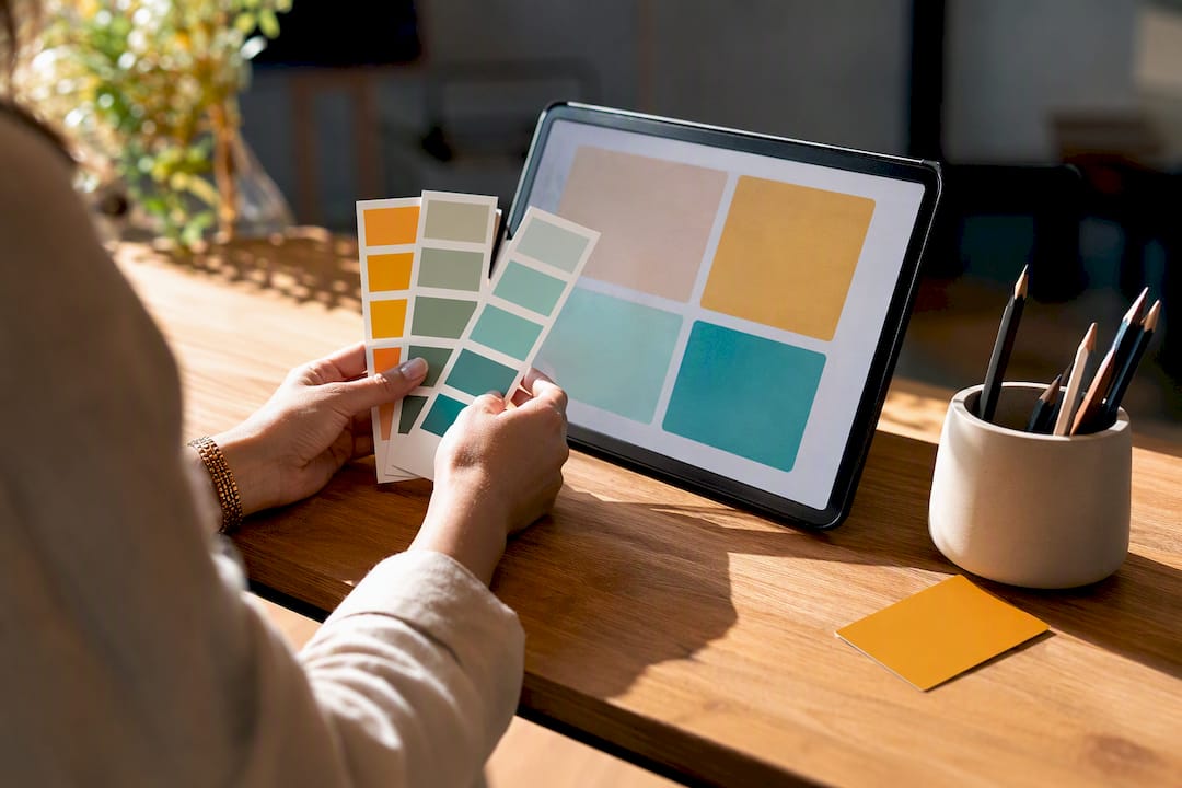 Hands reviewing a social media style guide