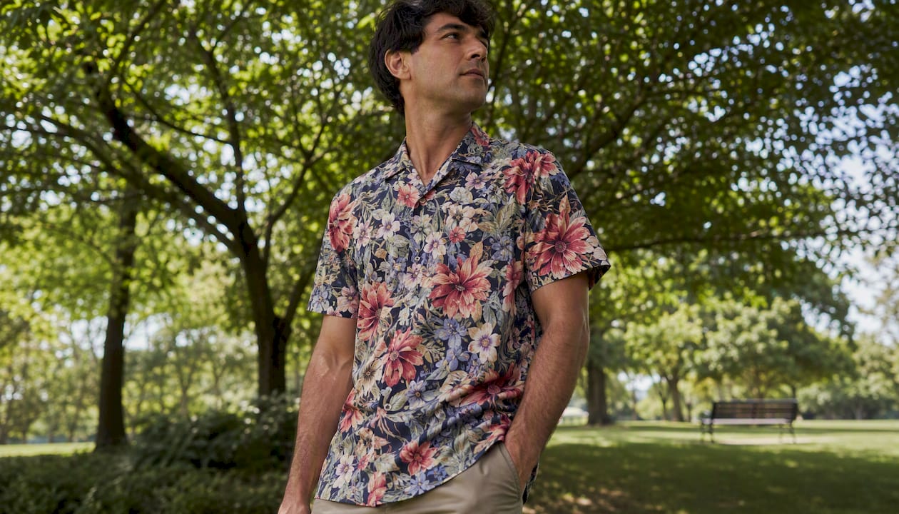 Man wearing floral pattern shirt outdoors