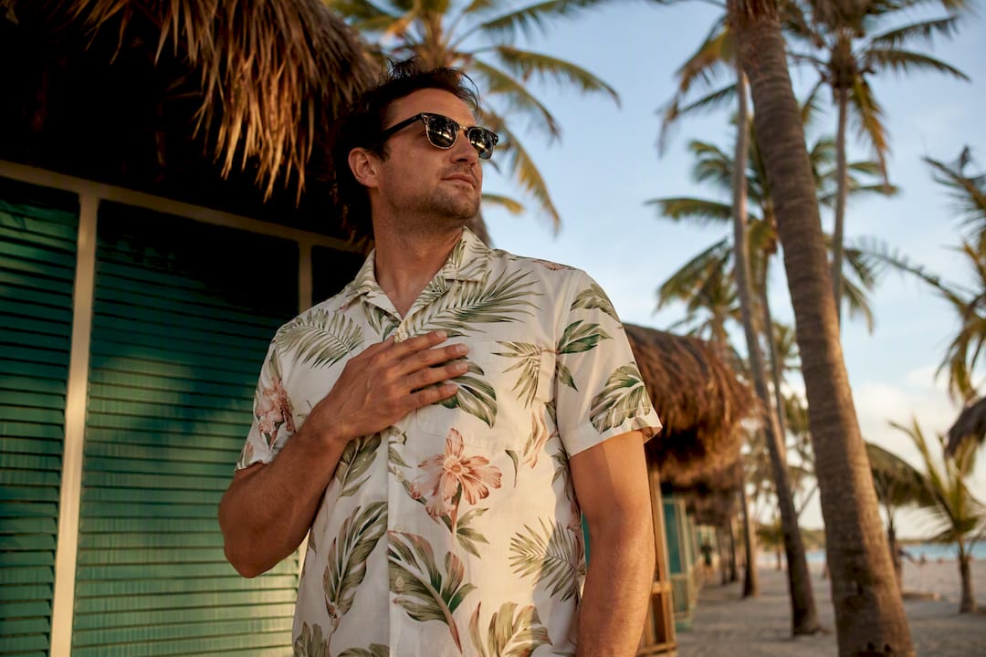 Man touching breathable cotton Dan Flashes shirt fabric