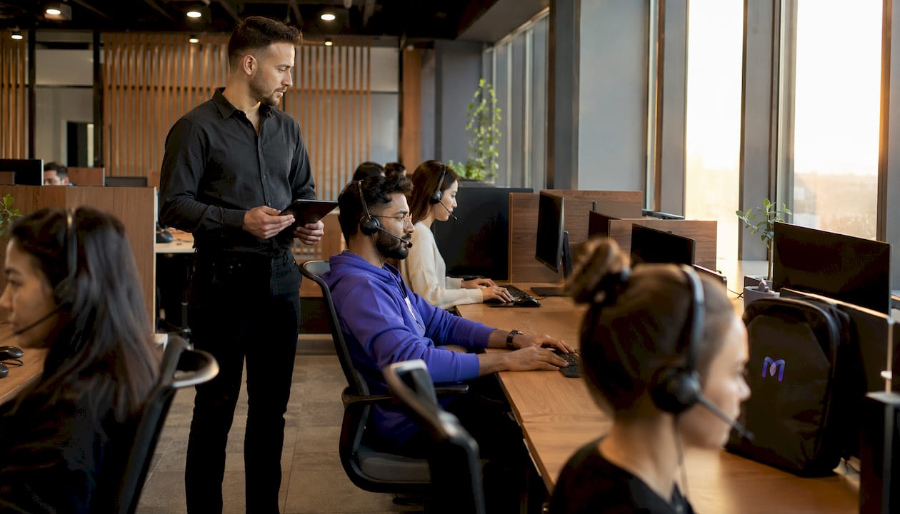 Call center agents working during transcription process