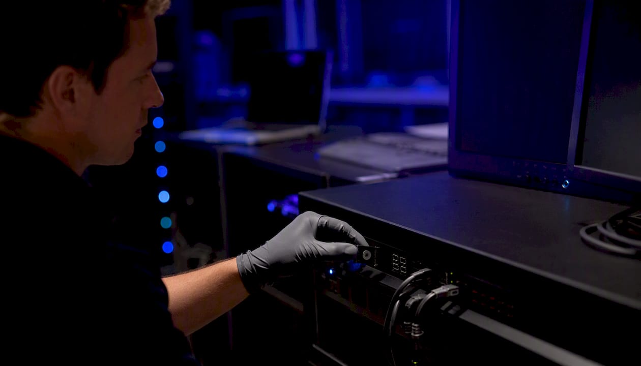 Hand adjusting security token in AI risk lab