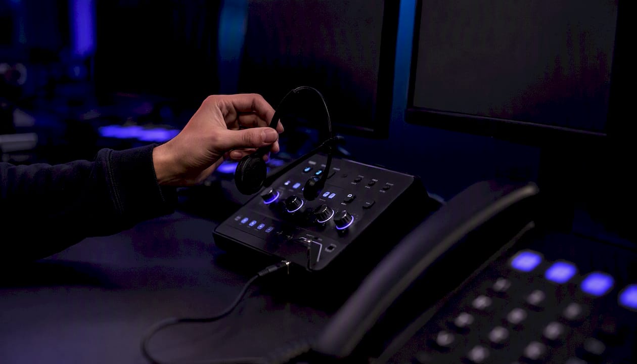 Hand plugging in headset for voice chat support