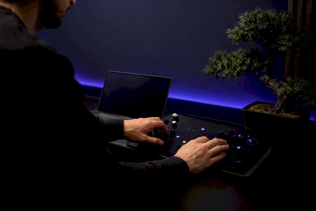 Hands adjusting voice agent control panel