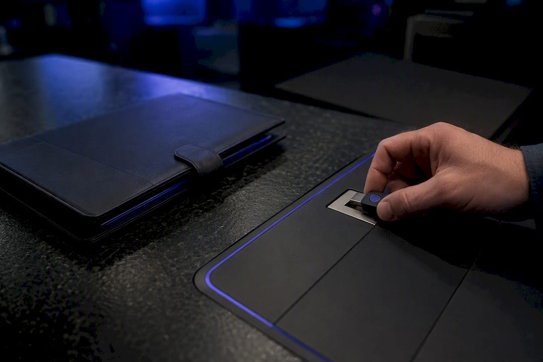 Hand inserting security token into device