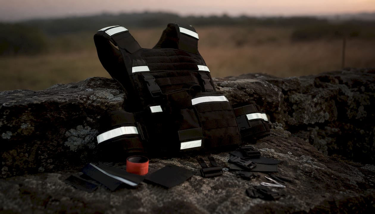 Top-down view of tactical vest with reflective strips