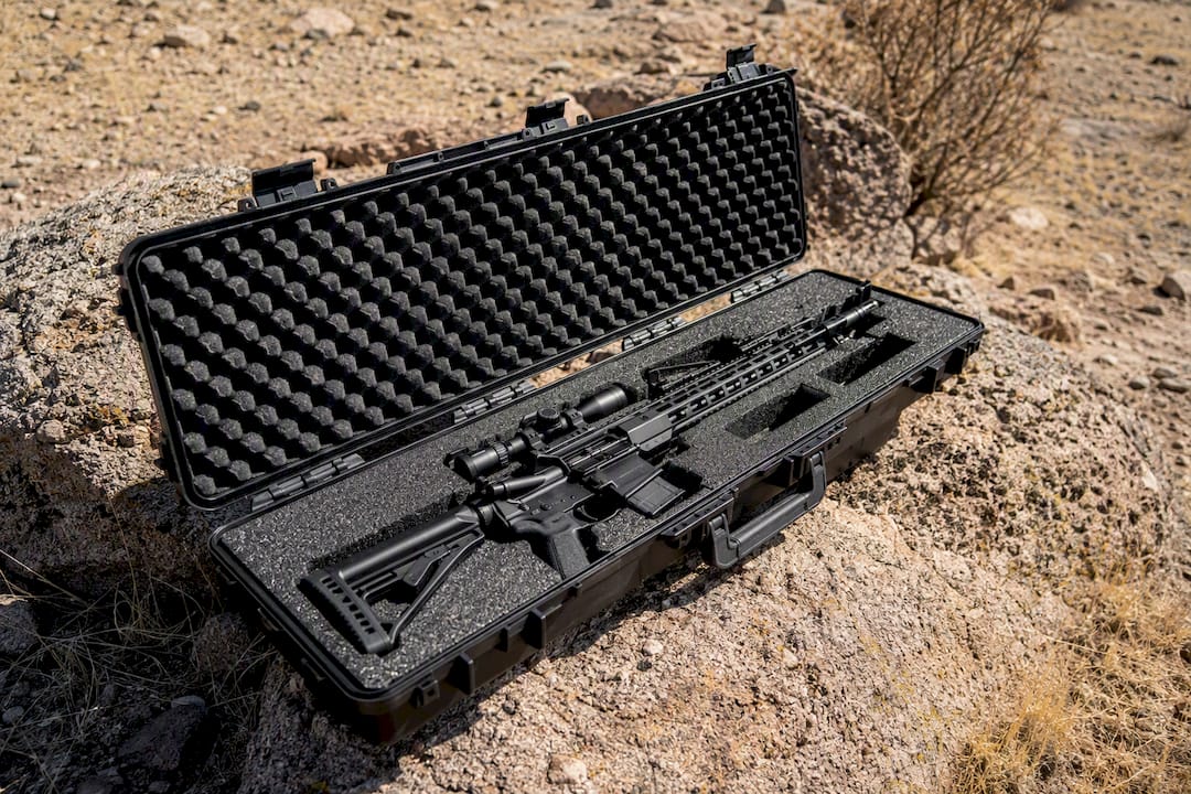 Rifle secured firmly in foam cradle inside case