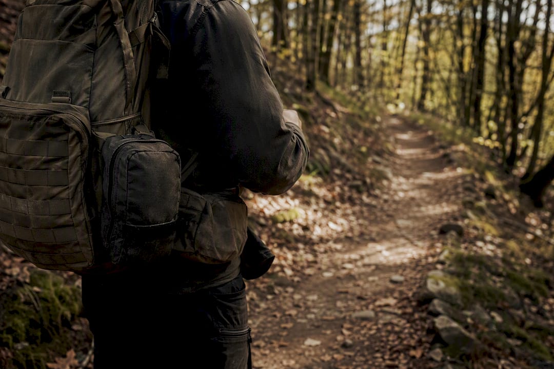 Balanced tactical backpack on hiking trail
