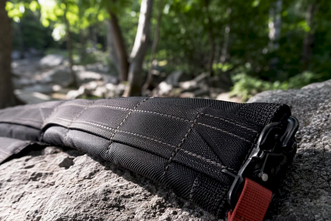 Close-up of ballistic fabric and locking latch detail