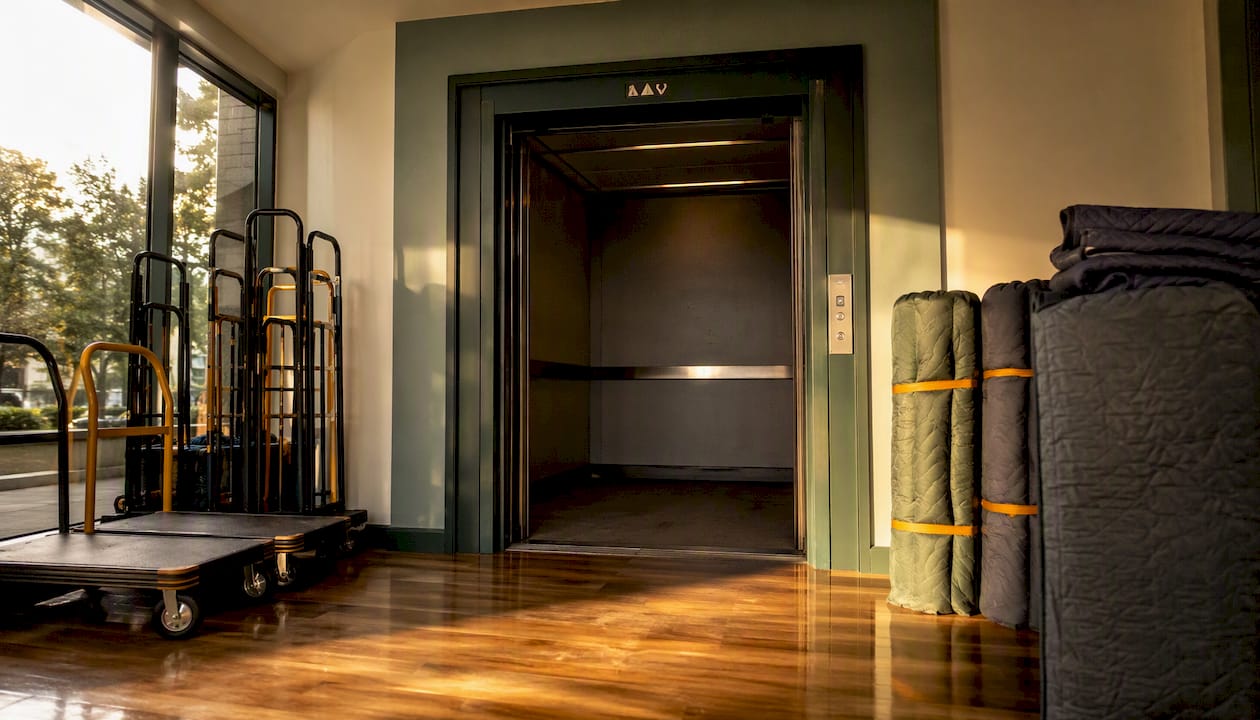 Elevator lobby with moving equipment prepared