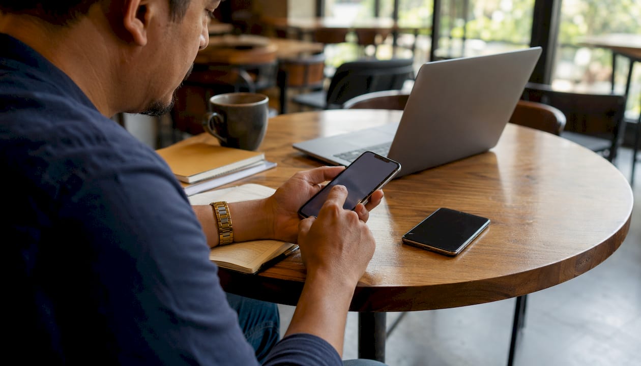 Hands testing business messaging on phones