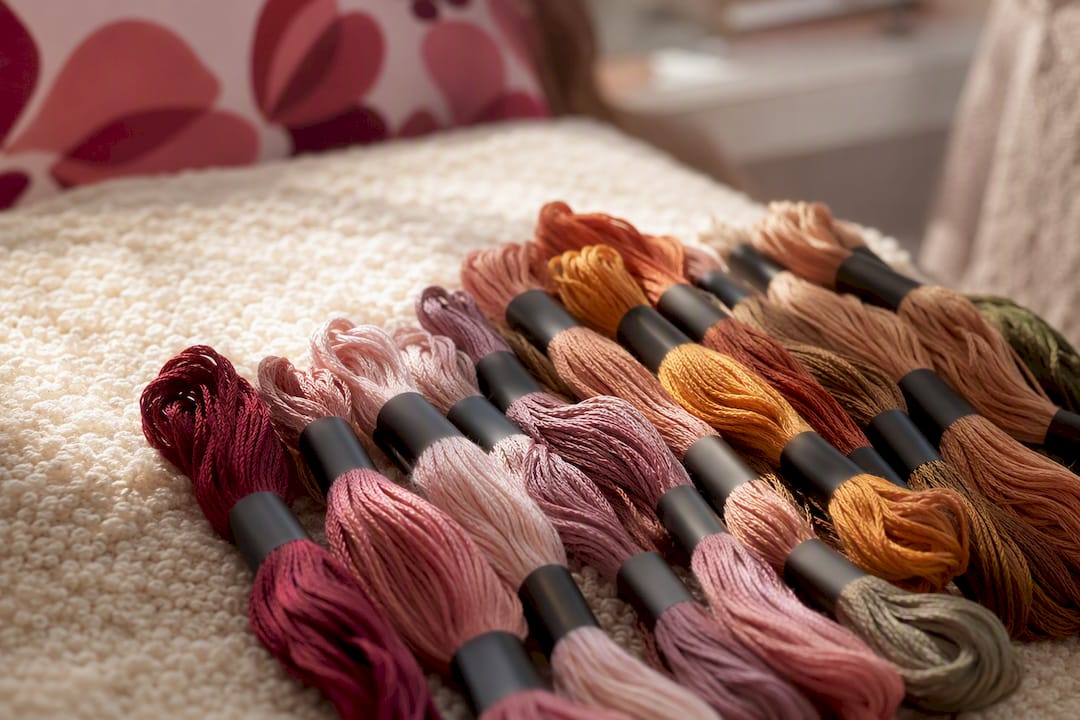 Embroidery floss skeins showing color variation