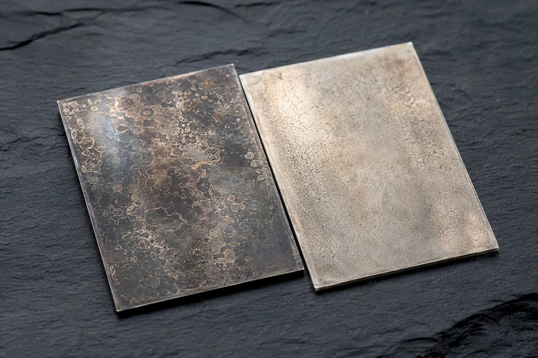Close-up of 925 and 950 silver patina textures