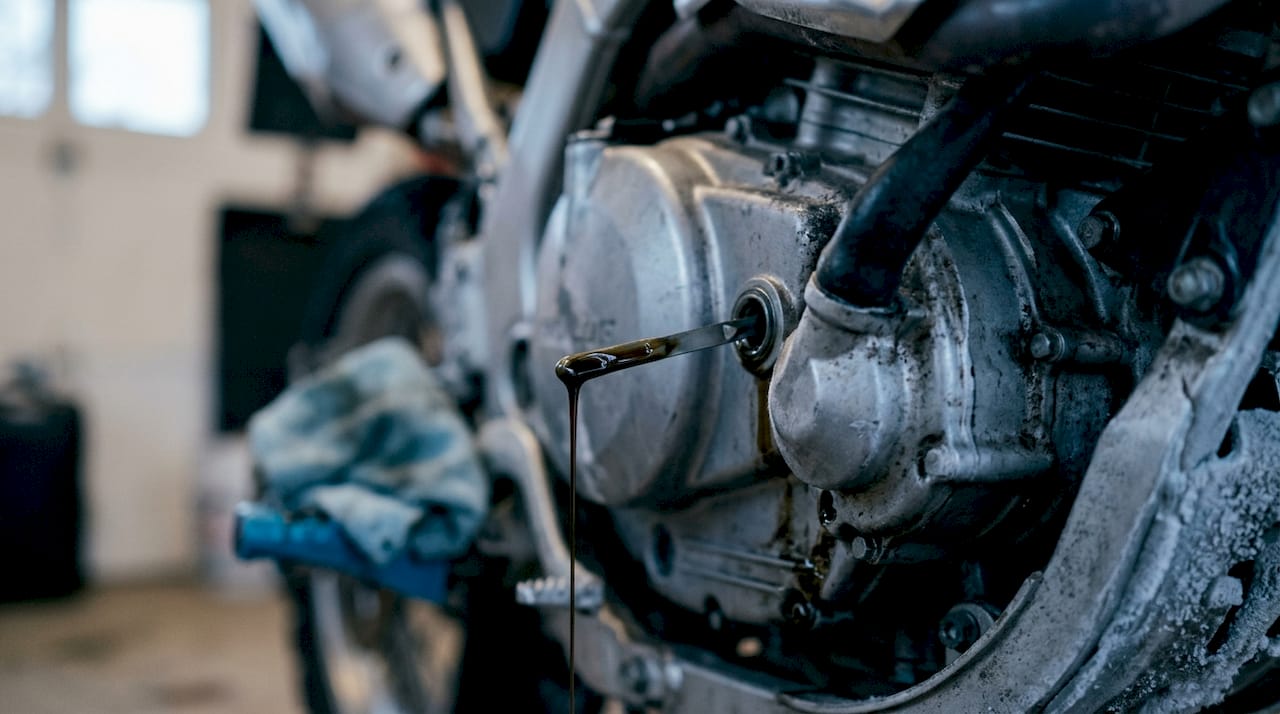 Close-up of thick cold engine oil in motorcycle engine