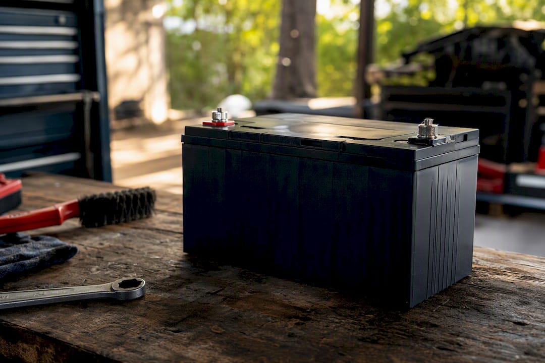 Close-up of AGM battery on workshop bench