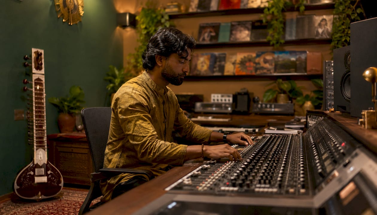 Rajib Karmakar sitarrajib World Music Sounds for Media Production: A U.S. Guide 2 Audio engineer mixing sitar recording in studio booth