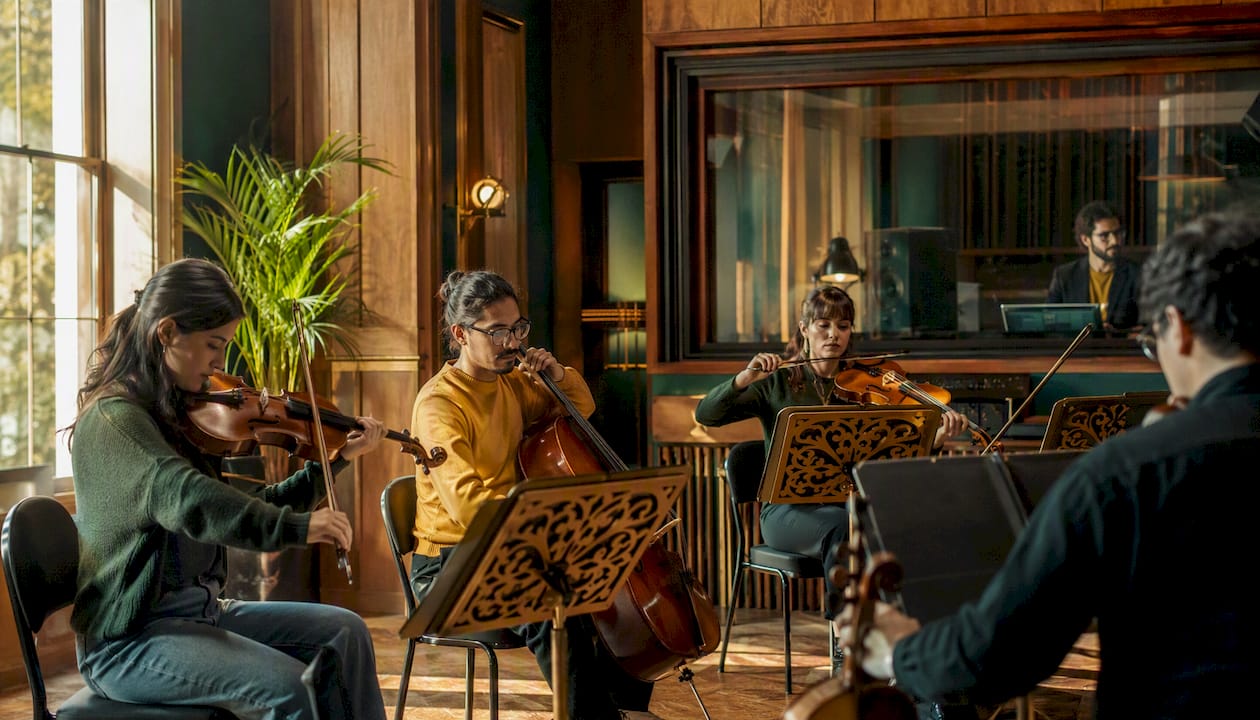 Rajib Karmakar sitarrajib The Role of Leitmotif in Film Music: A Composer's Guide 4 Orchestral musicians tuning in recording studio before session