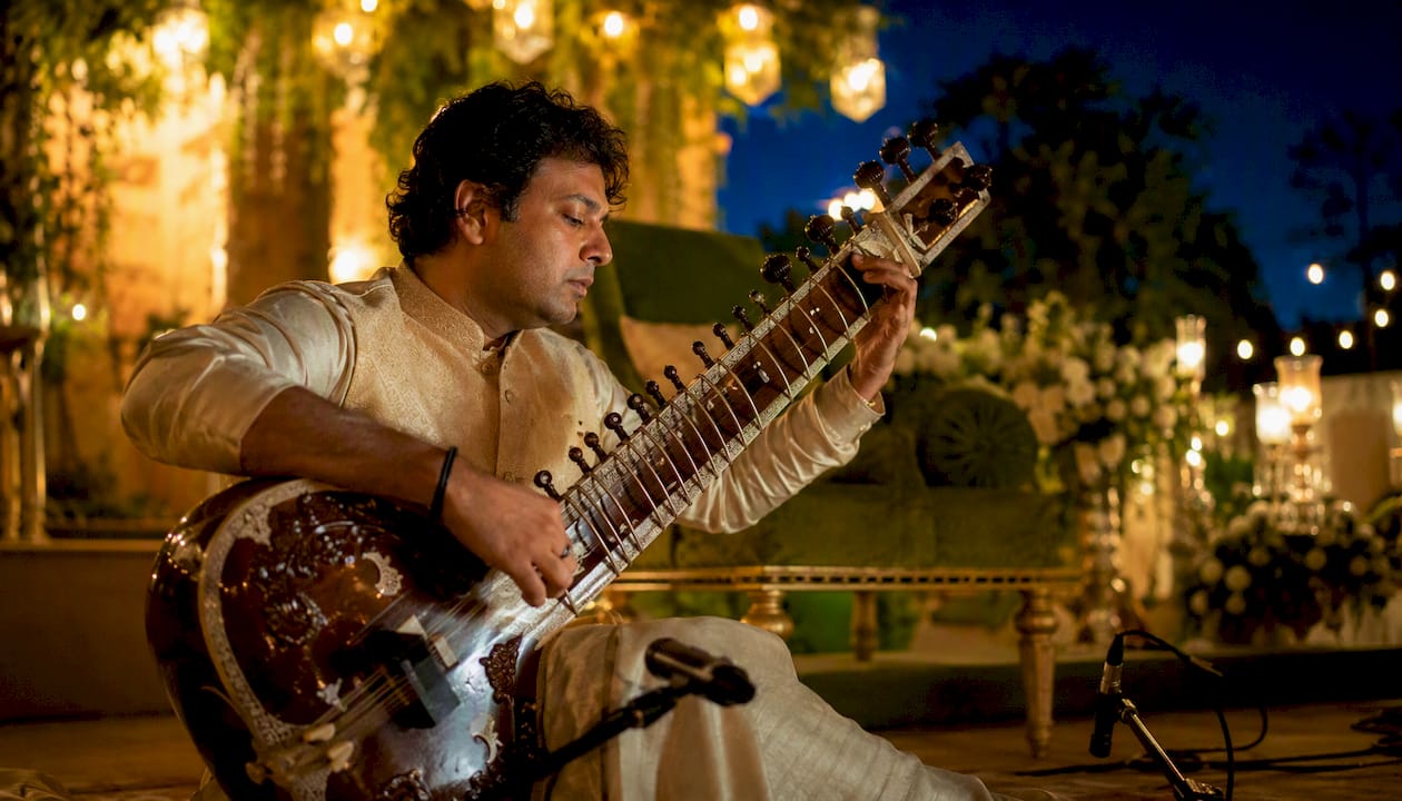 Rajib Karmakar sitarrajib Ceremony Processional Music: Top Picks and Timing Tips 3 Sitar musician adjusting tempo live at ceremony