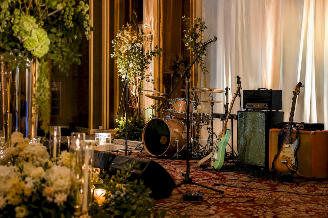 Rajib Karmakar sitarrajib What Is a Destination Wedding Music Act? A Planning Guide 3 Local band stage setup at wedding reception