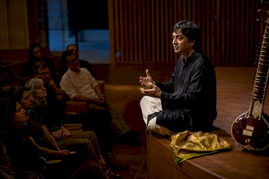 Rajib Karmakar sitarrajib Evidence Based Audience Engagement in Concerts: Checklist + Sitar 2 Sitarist giving pre-concert context