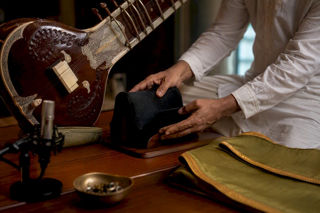 Sitar prepared with stand and protective cover