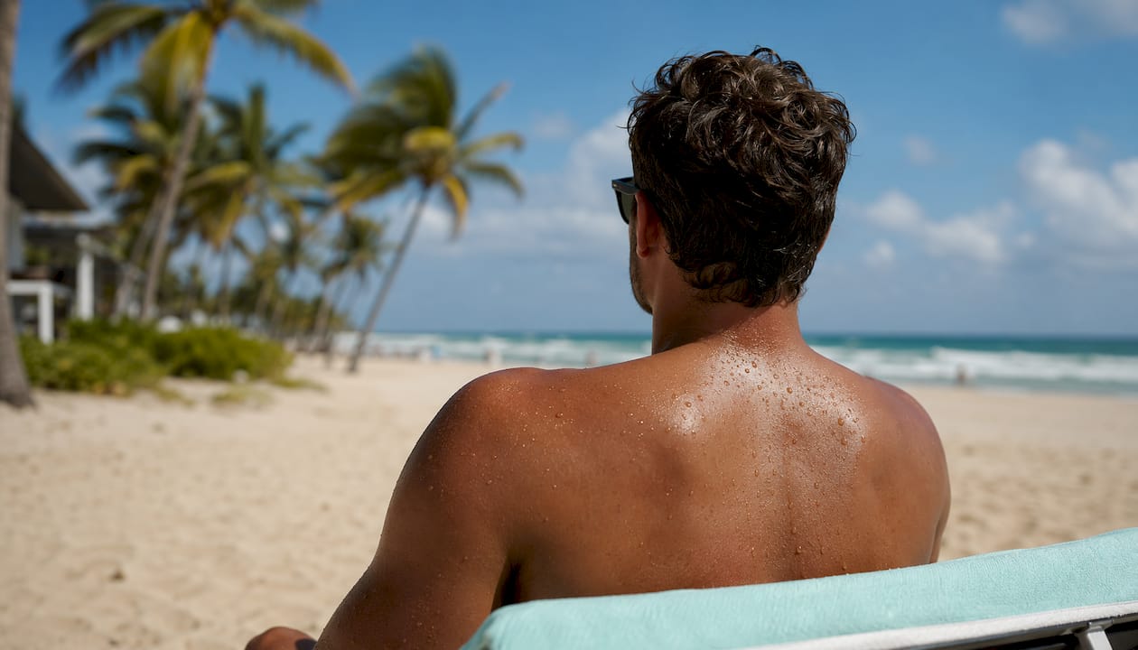 Back close-up showing sweat and skin pores